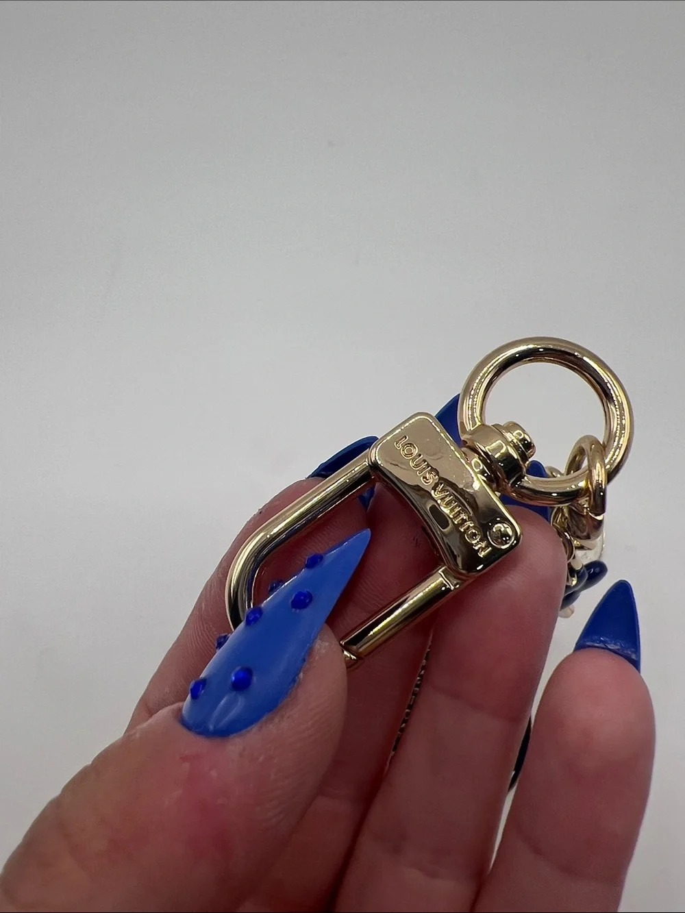 1445. Gold Tone with Navy & White Charm Keychain
